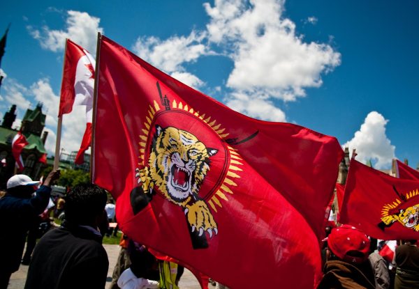 Protesters gather in Ottawa to demand that the Canadian government take action regarding the ongoing conflict between Sri Lanka and Tamil forces. Shutterstock Asset id: 31649554